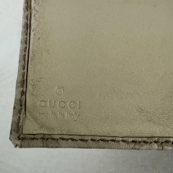 Gucci Guccissima Ivory Leather GG Logo BiFold Wallet, Gold Piston Closure